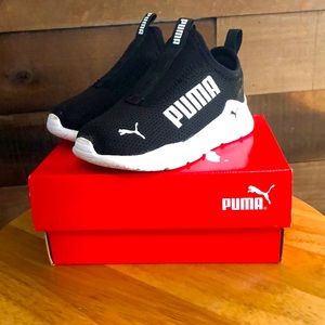 PUMA. Children’s size 6 sneakers (size 6c). Slide on. Worn once! Black and white